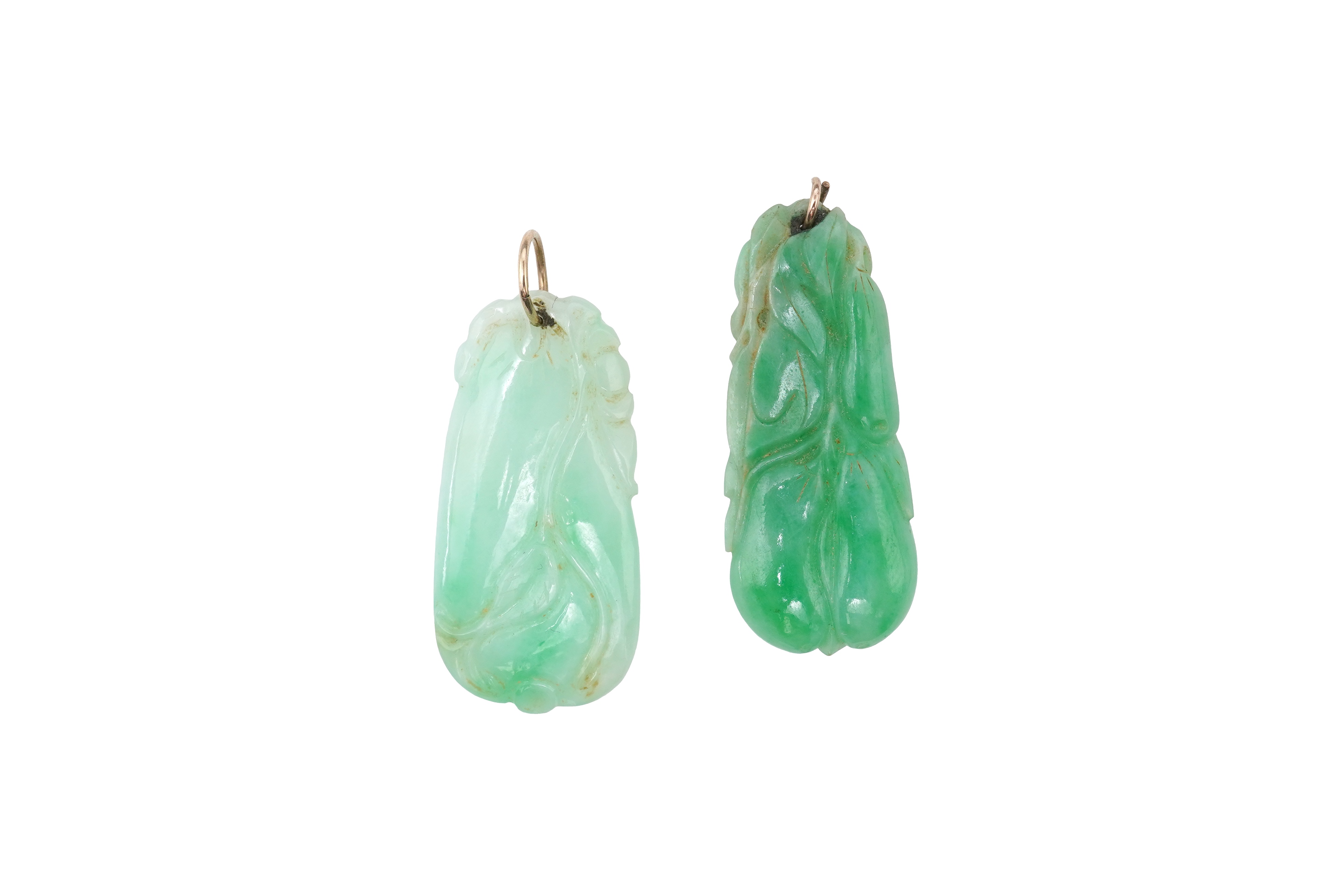 Two carved jadeite pendants, China, early 20th century, each carved to depict a fruiting vine of bitter gourd, longest 3.5cm excluding bail, combined gross weight approximately 10 grams